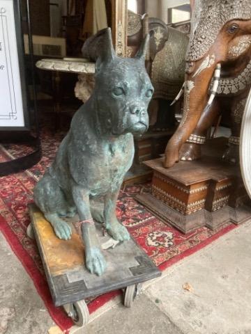 Bronze garden statue of a dog